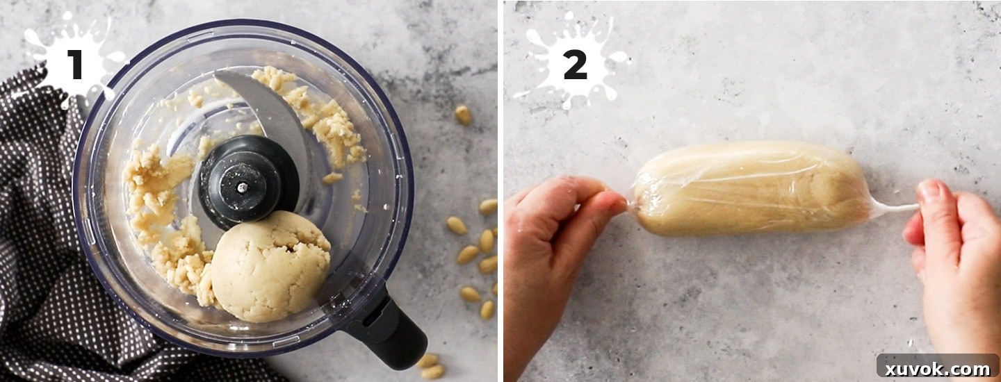 Almond paste in a food processor showing the texture.