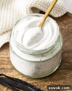 A spoon in a jar of vanilla sugar.