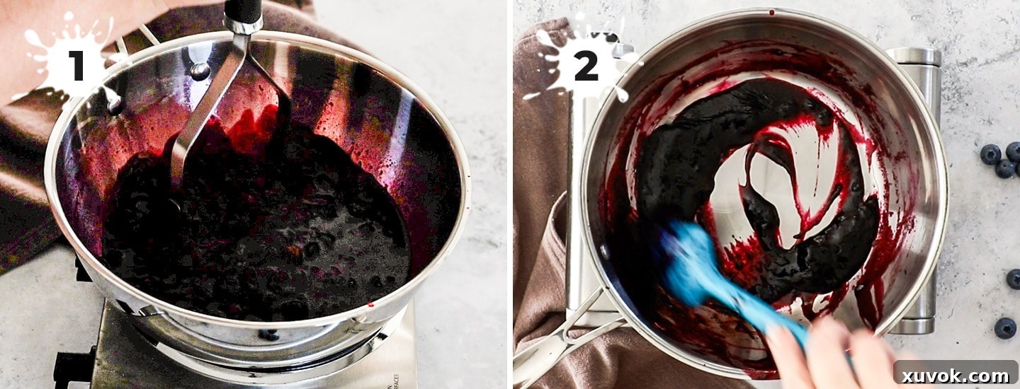 Blueberries and lemon juice simmering in a saucepan to create a sauce.