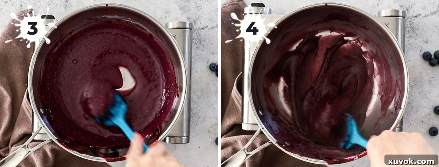 Mixture of blueberry puree, flour, milk, and sugar thickening in a pan to form the pudding base for the frosting.