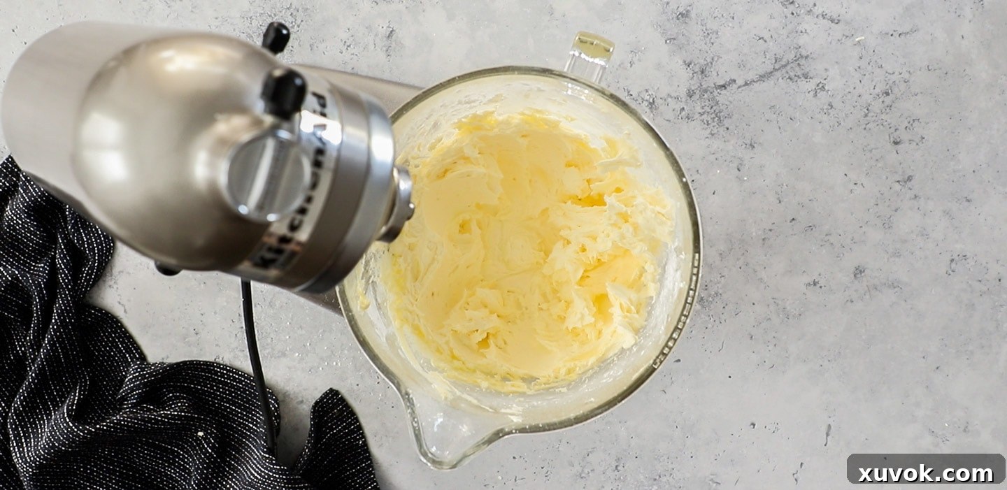 Whipped butter in a stand mixer bowl.
