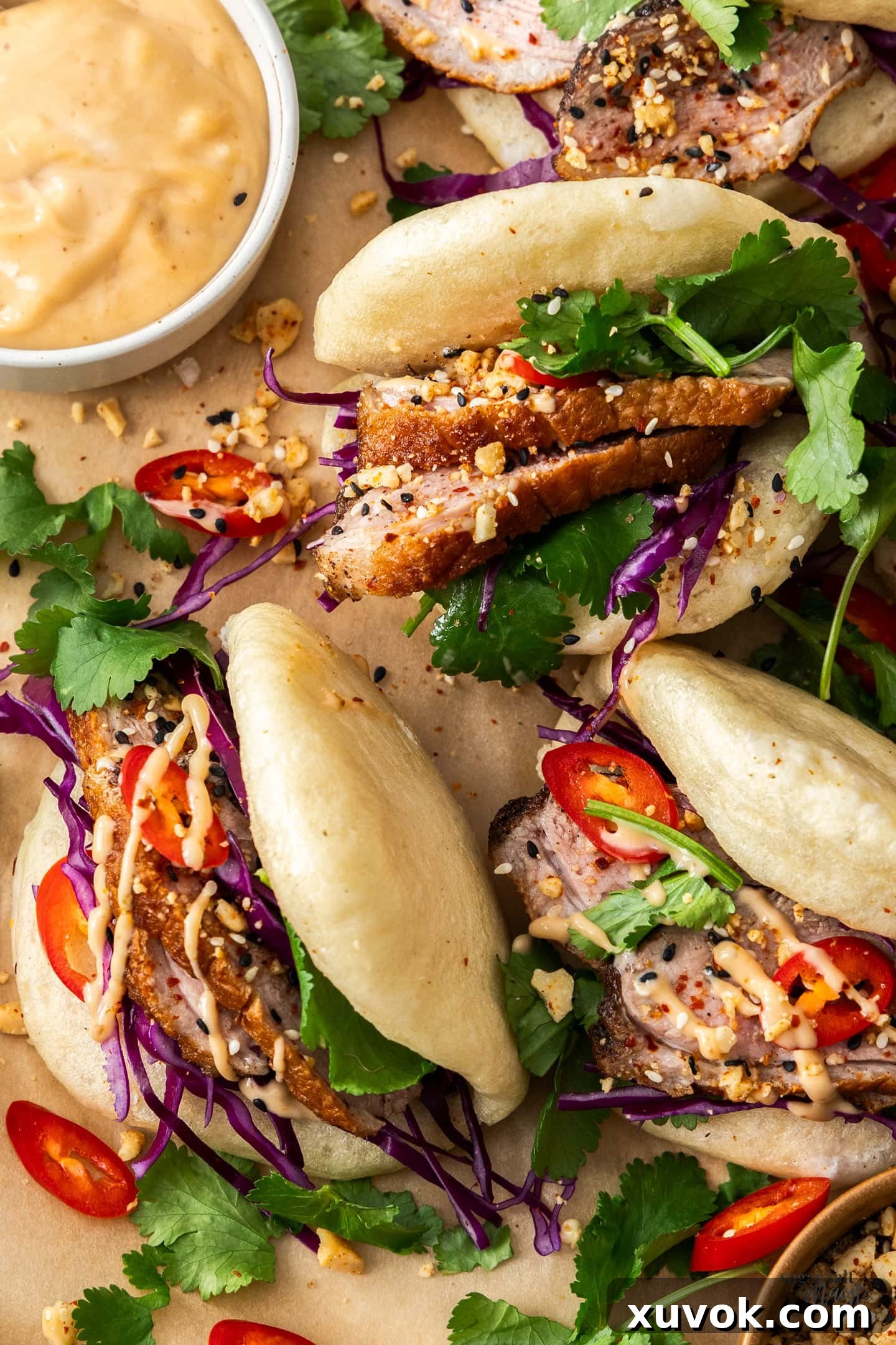 Top down view of 3 duck bao.