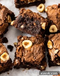 A brownie cut to show the fudgy inside.