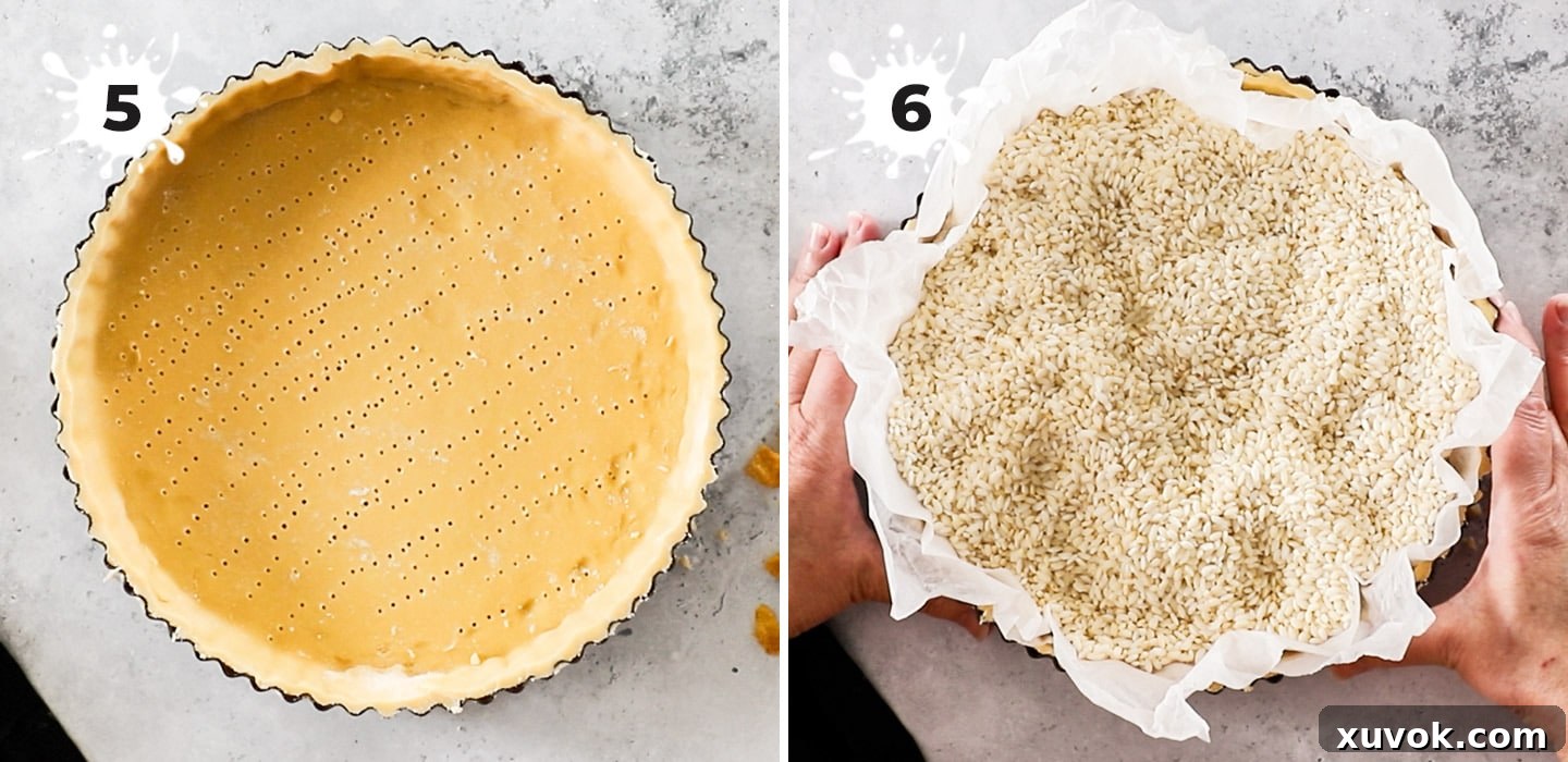 A close-up view illustrating the preparation of the tart shell for blind baking, showing how to prick the base and add pie weights.