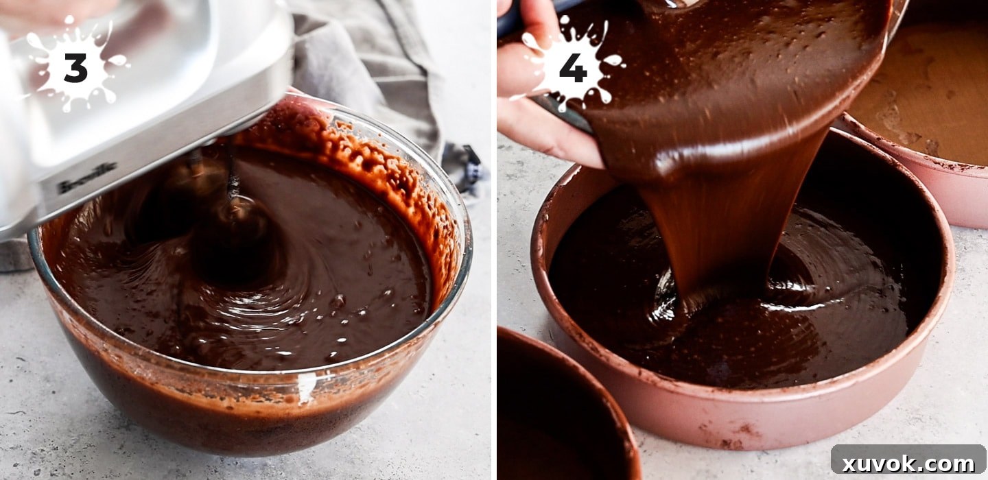 Smooth, dark chocolate cake batter being poured evenly into three prepared 8-inch round baking pans, ready for baking.
