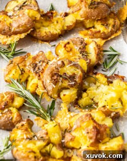 Close up of crunchy smashed potatoes, golden brown with crispy edges.
