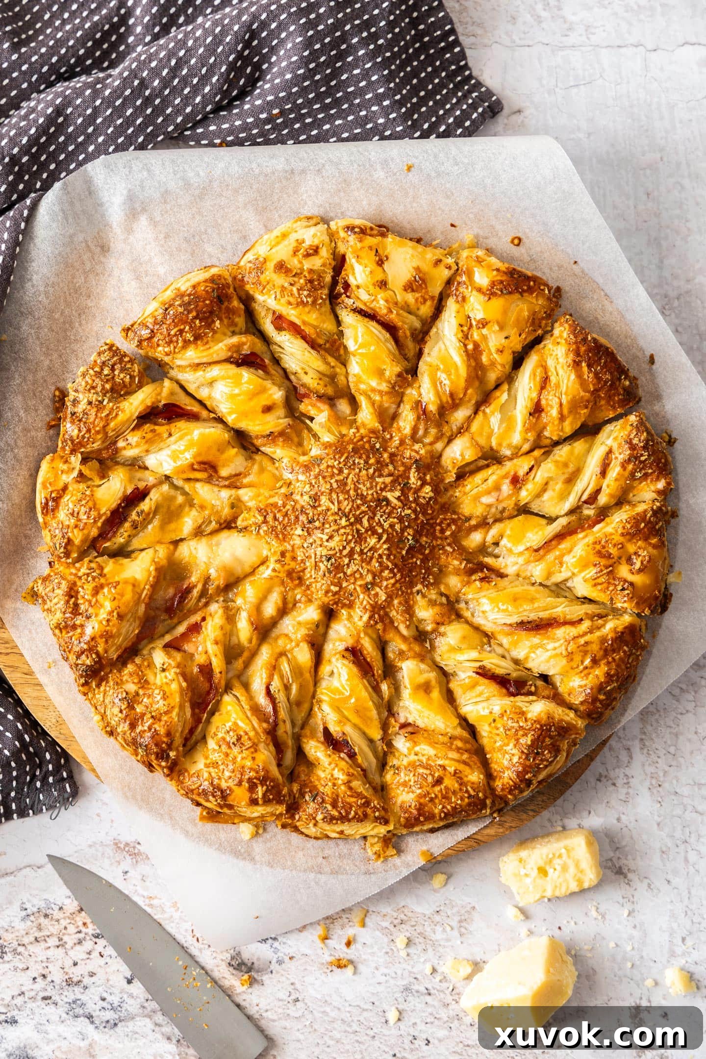 Top down view of a whole tarte soleil with ham and cheese filling.