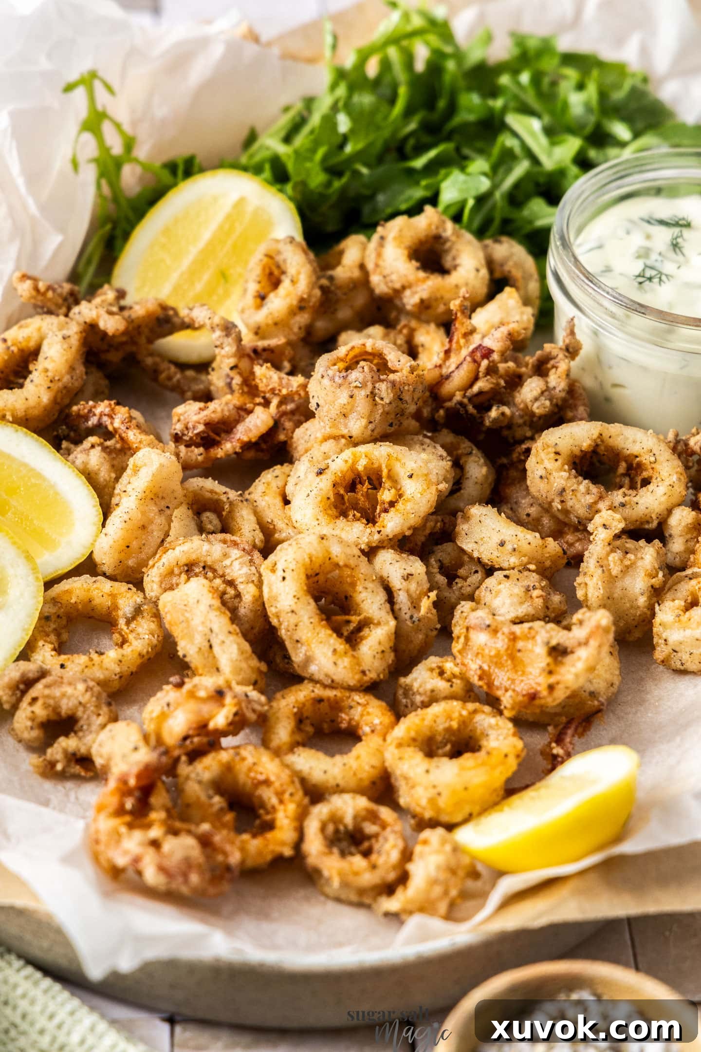 Salt and pepper squid on a platter.