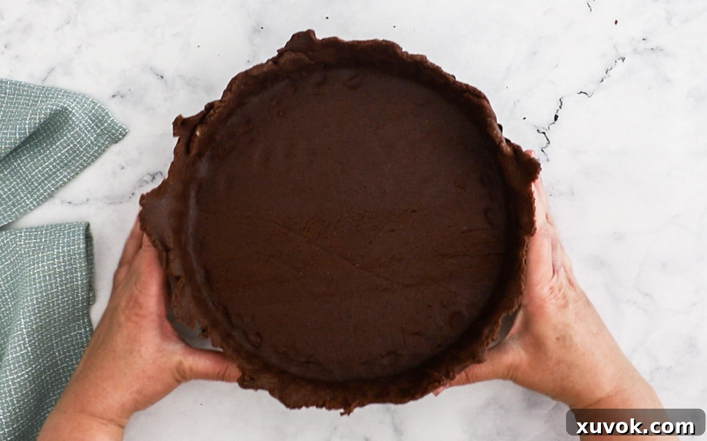 The tart shell shaped and ready to chill.