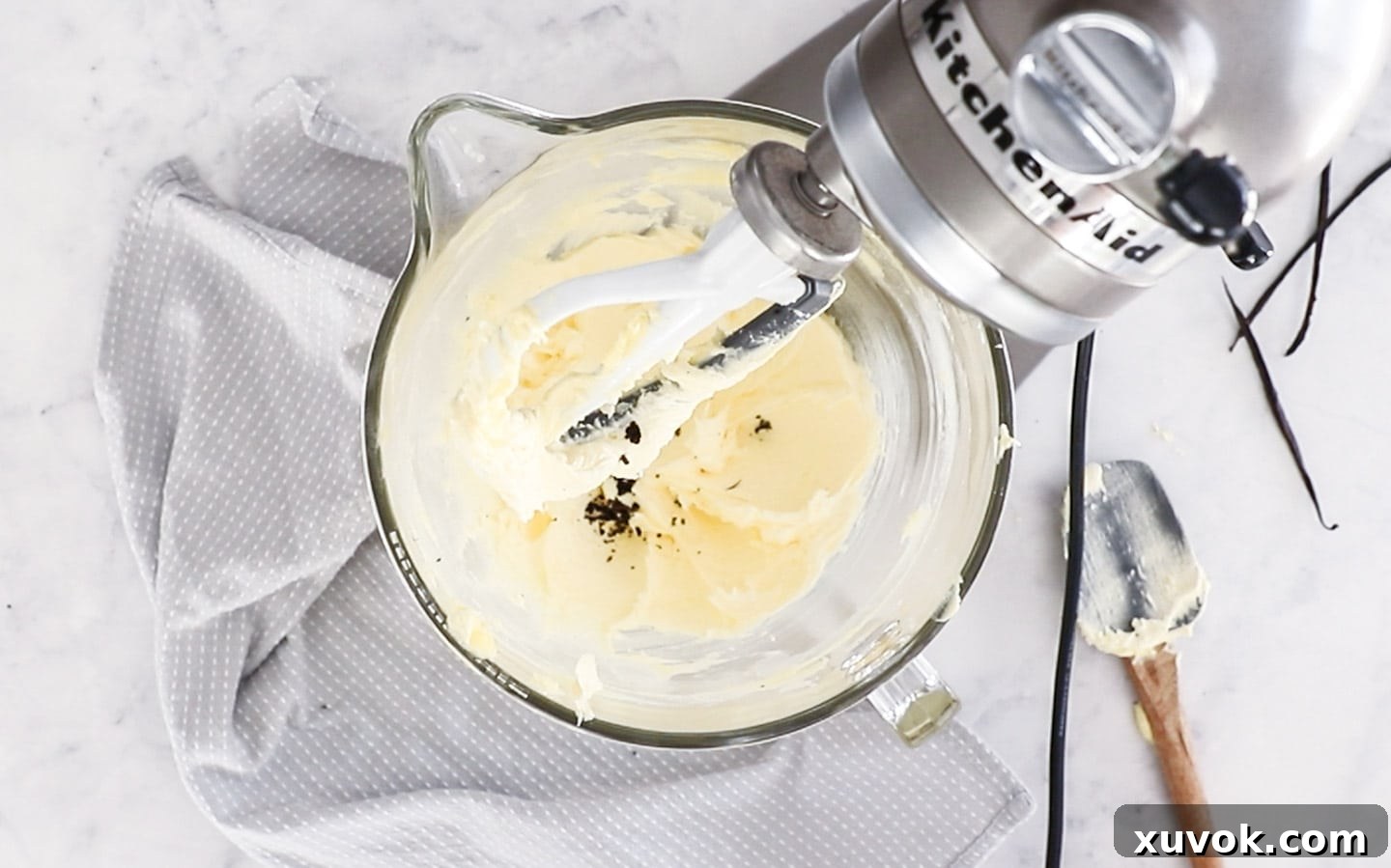 Light and creamy beaten butter and sugar in a stand mixer bowl.