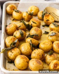Closeup of the potatoes with crispy sage over the top.