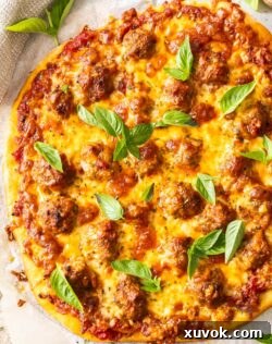 Top down view of meatball pizza.