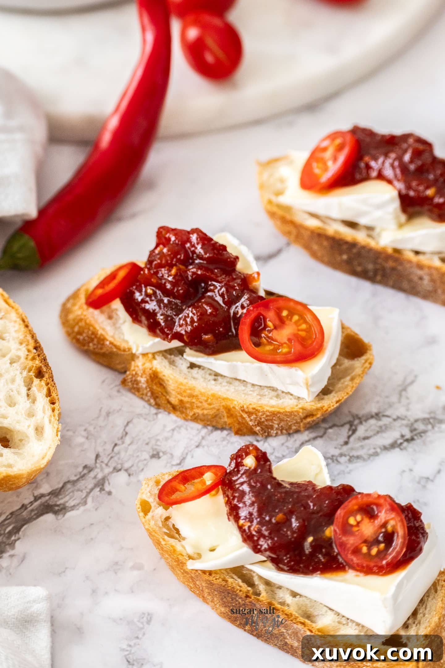 Tomato chilli jam with brie on crostini.