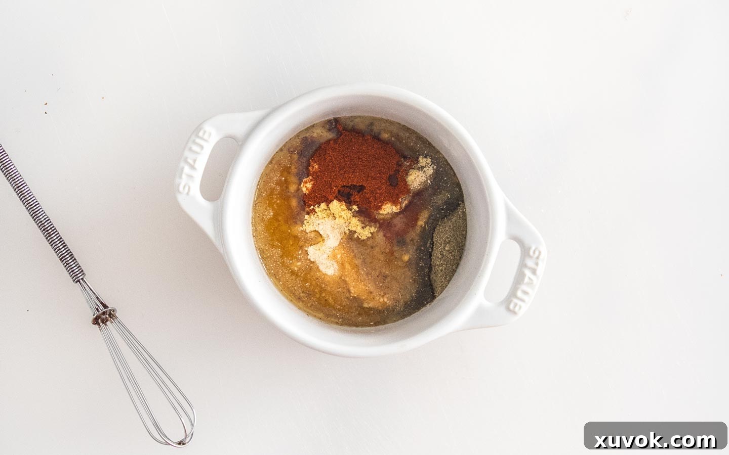 The seasoning for air fryer roast chicken in a ramekin.