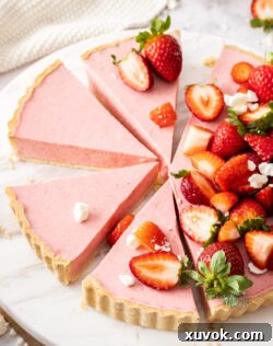 The tart with 4 slices cut.