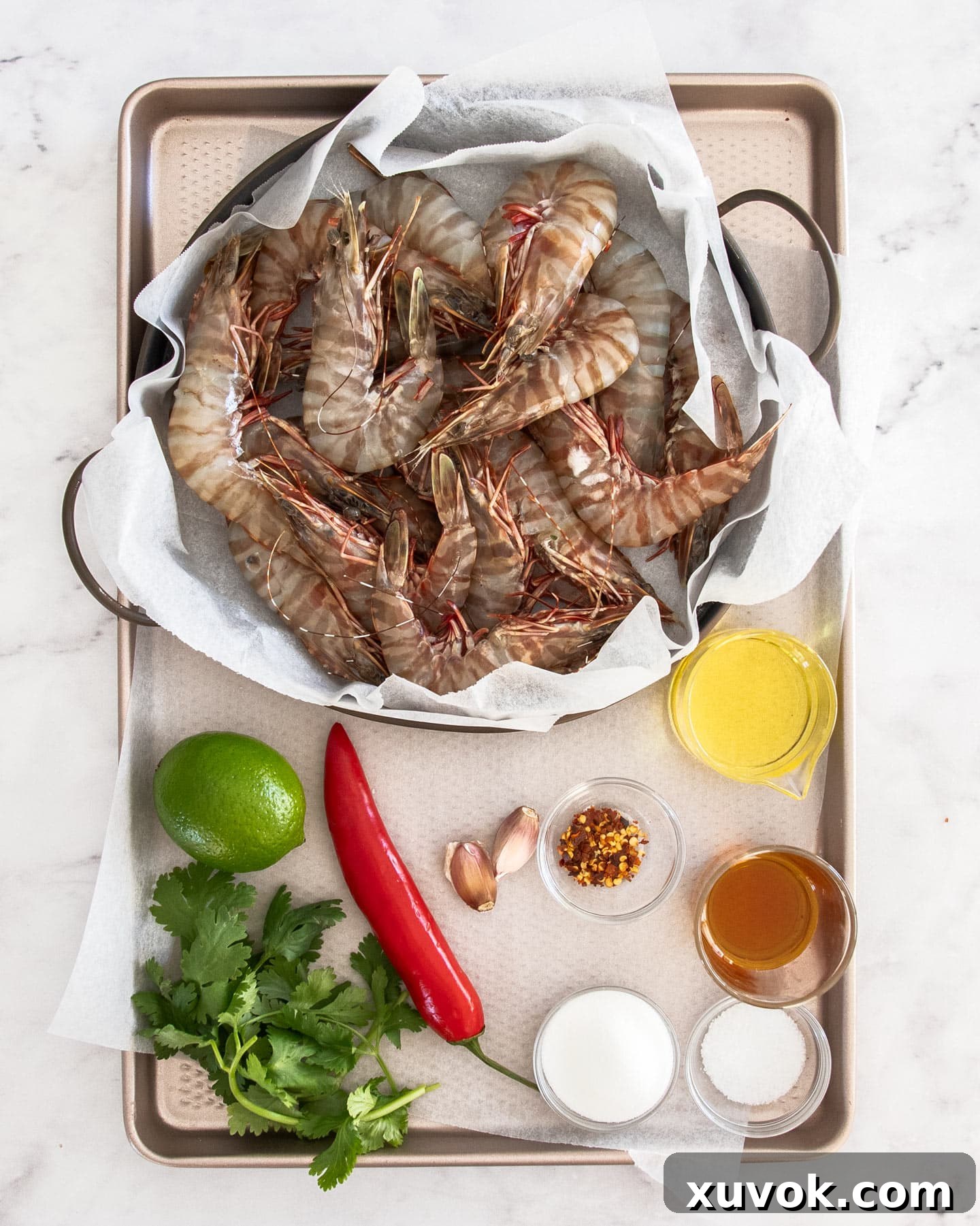 Ingredients for nam jim prawns laid out on a baking sheet.