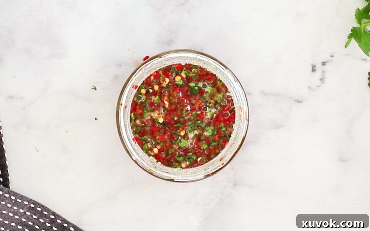 Top down view of the dressing mixed in a jar.