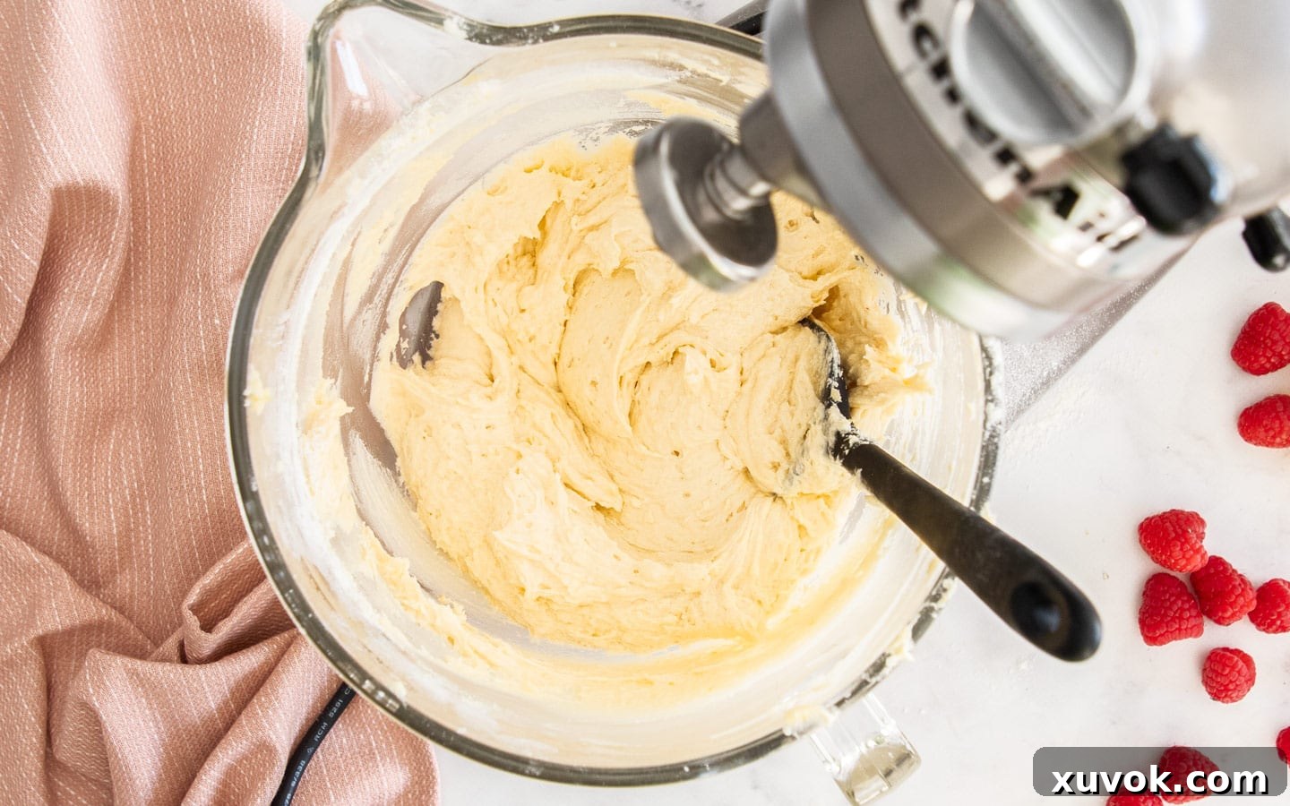 The smooth and creamy cake batter in a mixing bowl after all the flour and wet ingredients have been gently incorporated, showing a consistent texture.