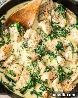 Closeup of the creamy garlic chicken in a pan.