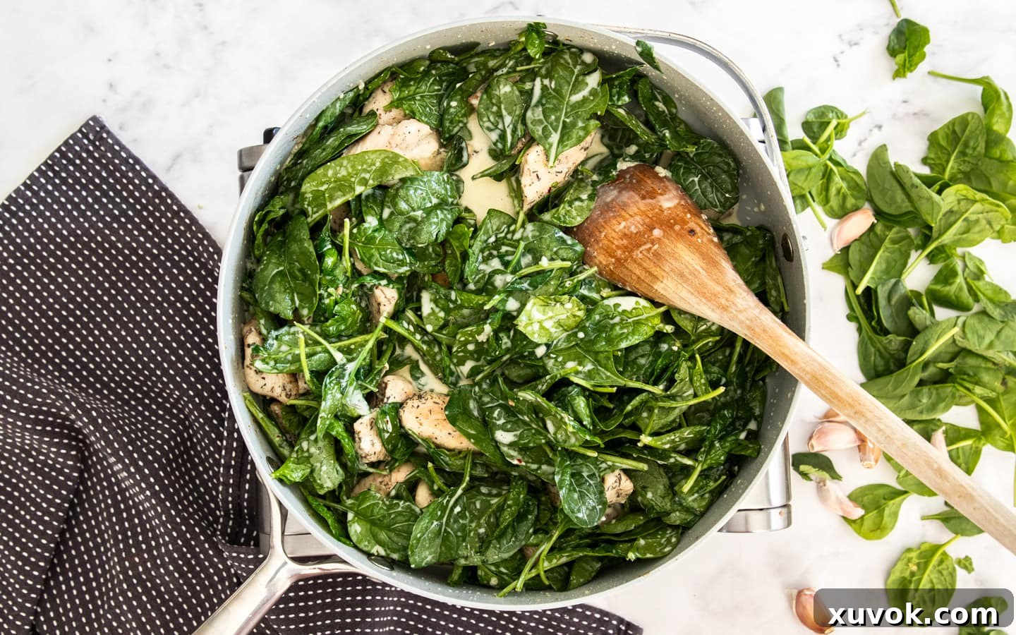The spinach being stirred in, before it's wilted.