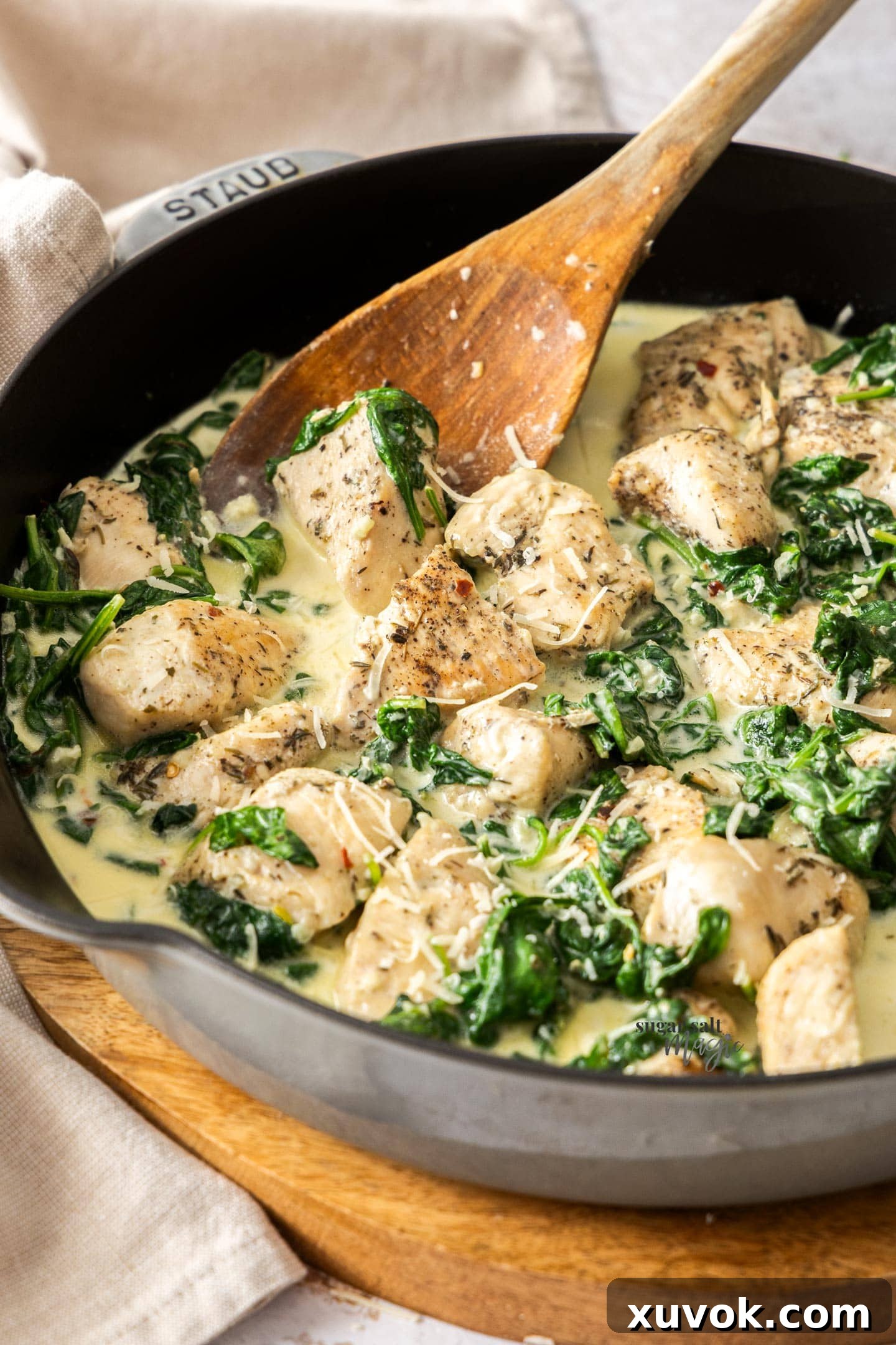 Creamy garlic chicken in a pan ready to serve.