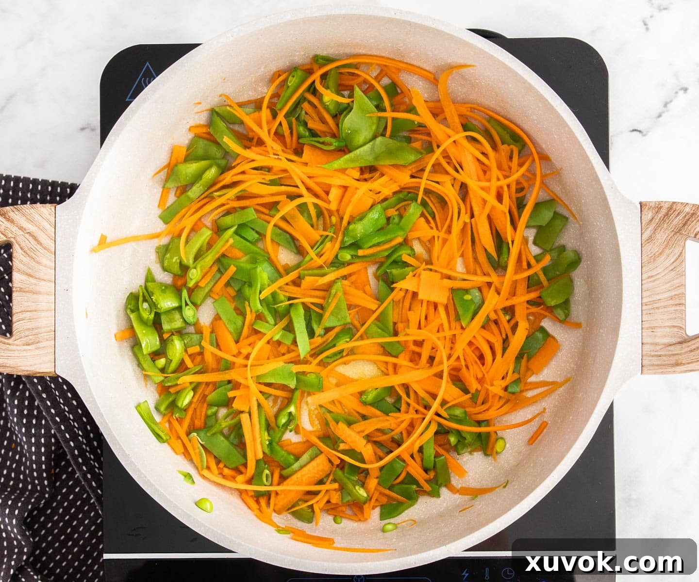 The vegetables in a pan.