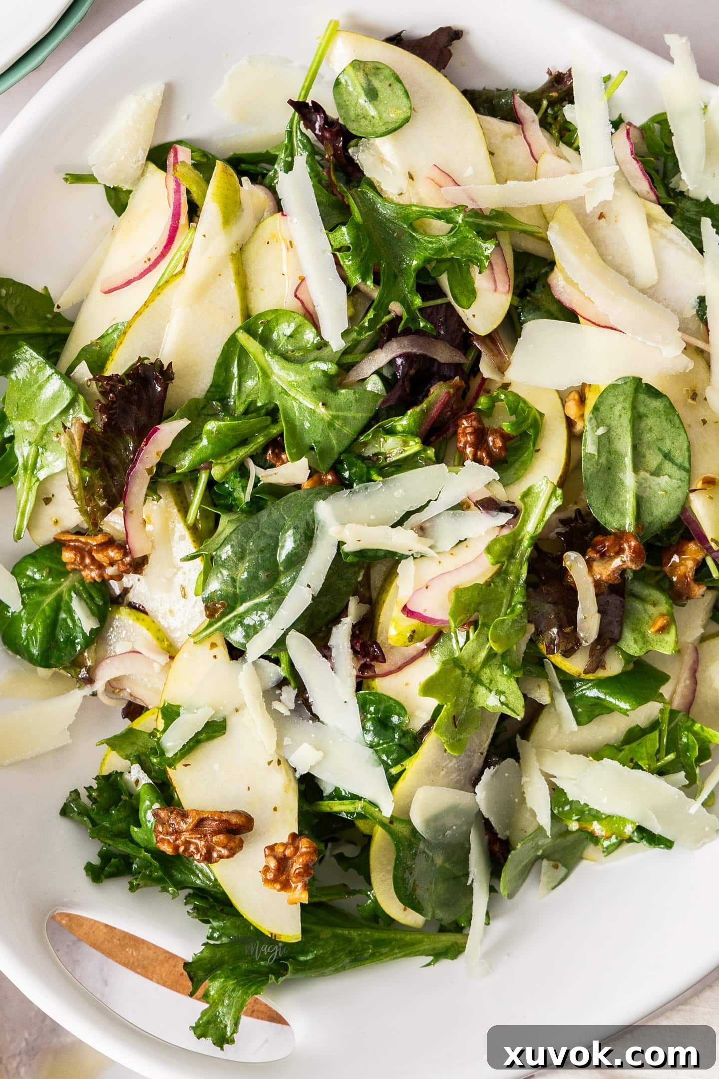 Top down view of the walnut pear salad in a vibrant presentation.