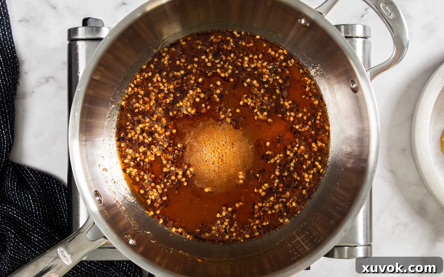 The ingredients bubbling in a pan.