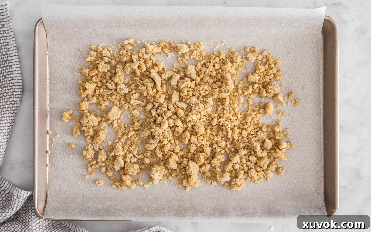 The raw streusel on a baking tray.