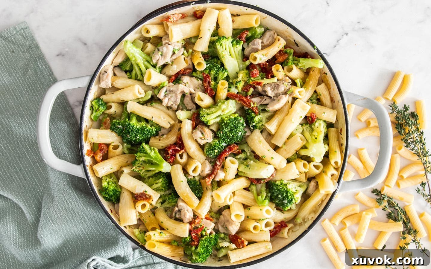 Broccoli, cream and sundried tomatoes stirred through the pasta bake.