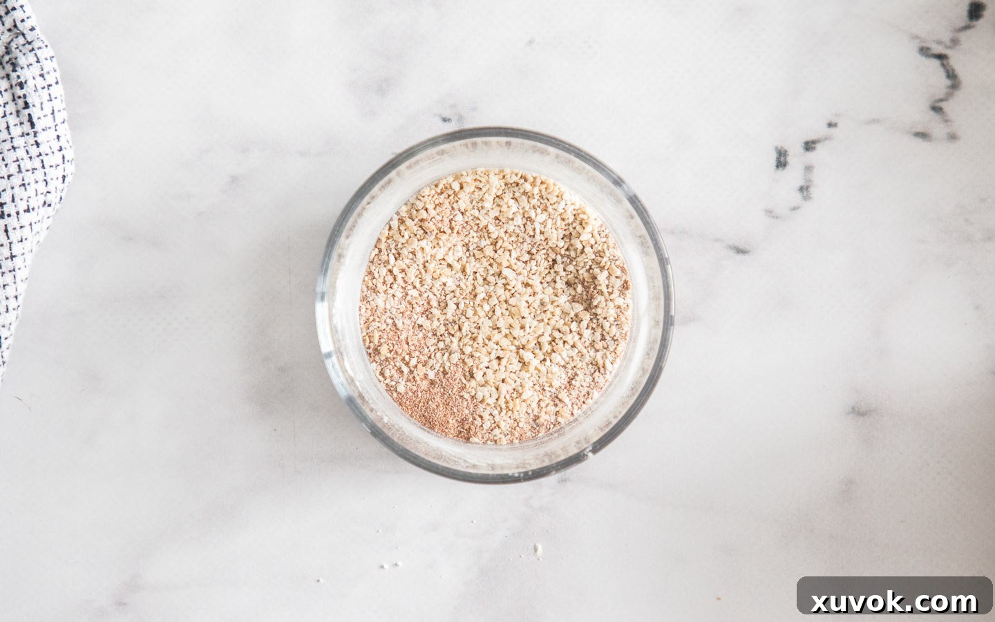 A small bowl containing the dry seasoning mixture for potato wedges.