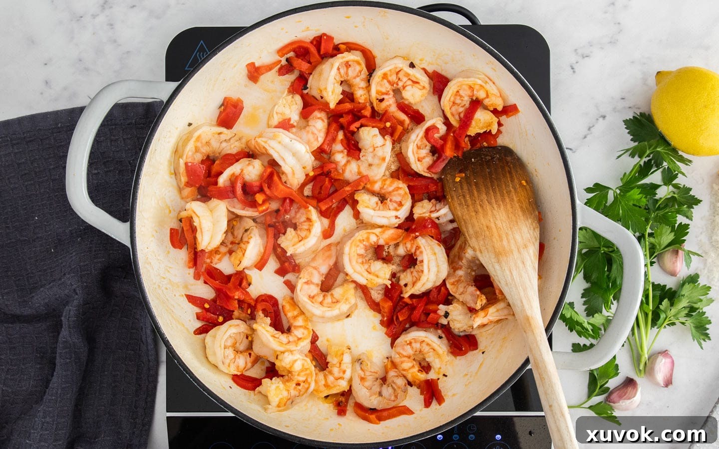 The roasted peppers just added to the pan.