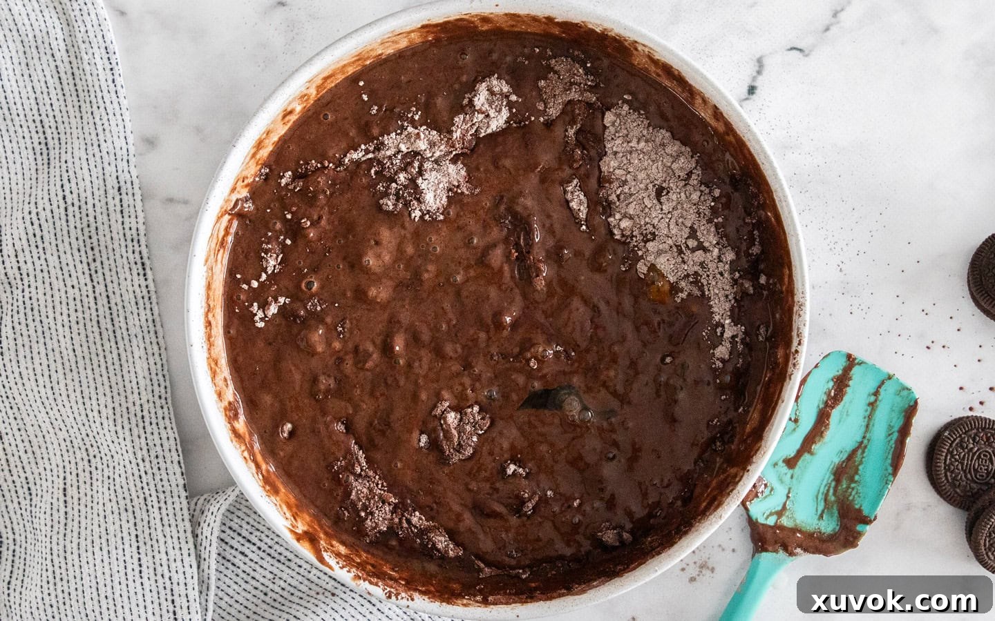 The batter for the cake partially combined.