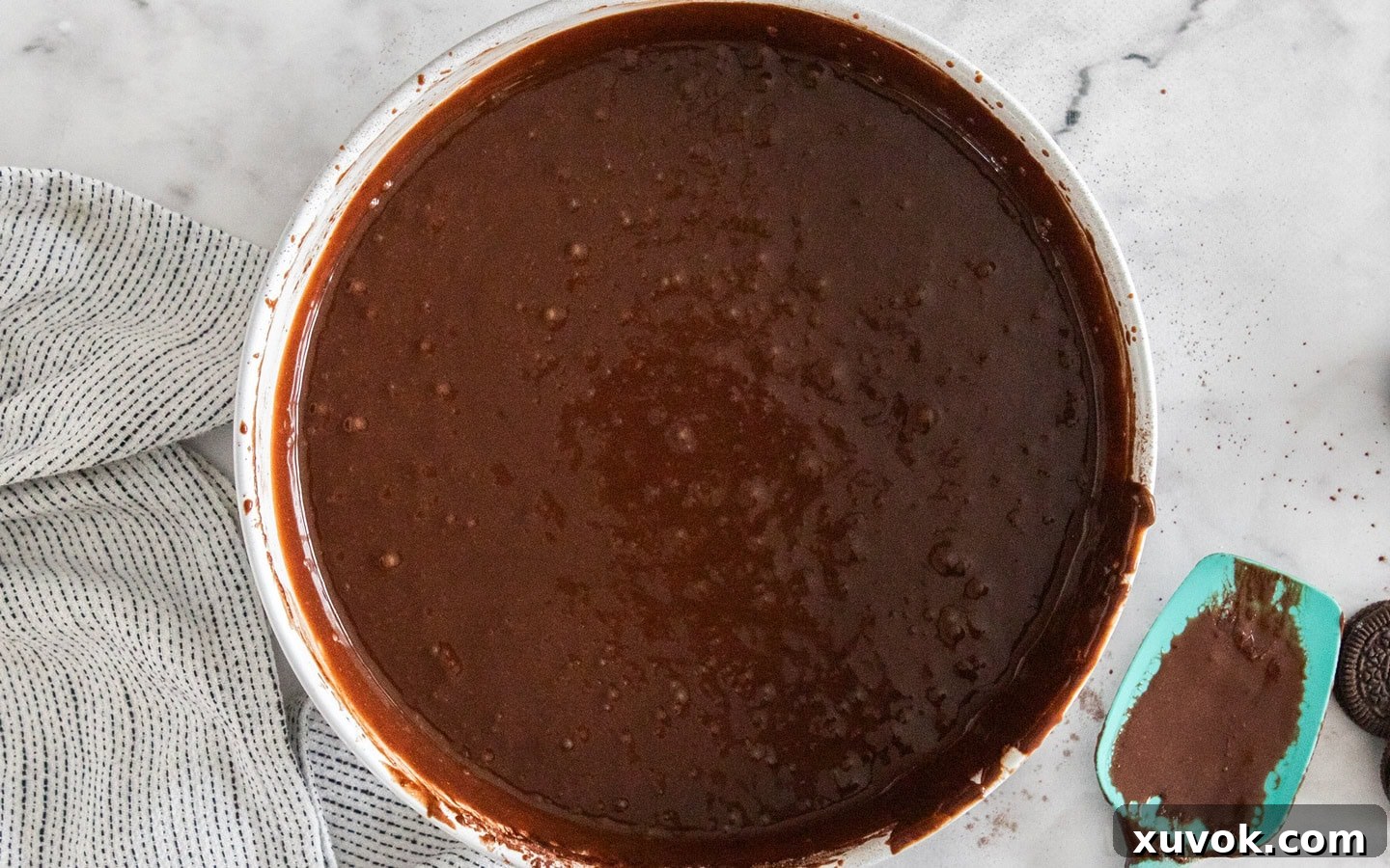 The chocolate cake batter in a mixing bowl.