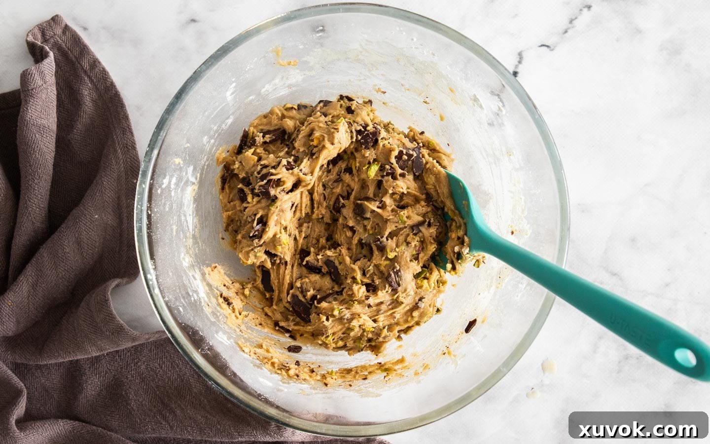 The dough with chocolate chunks and pistachios mixed through.