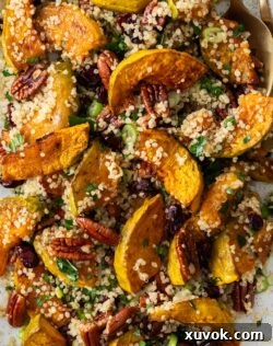 Top-down view of the pumpkin quinoa salad, showcasing its vibrant colors and appealing texture, ready for serving.
