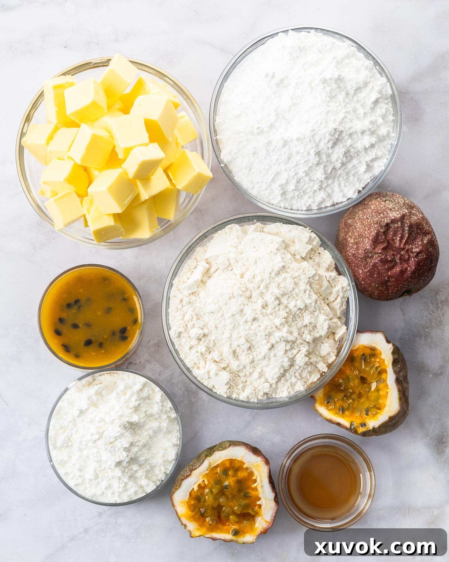 Ingredients for passionfruit melting moments, laid out neatly on a kitchen counter.