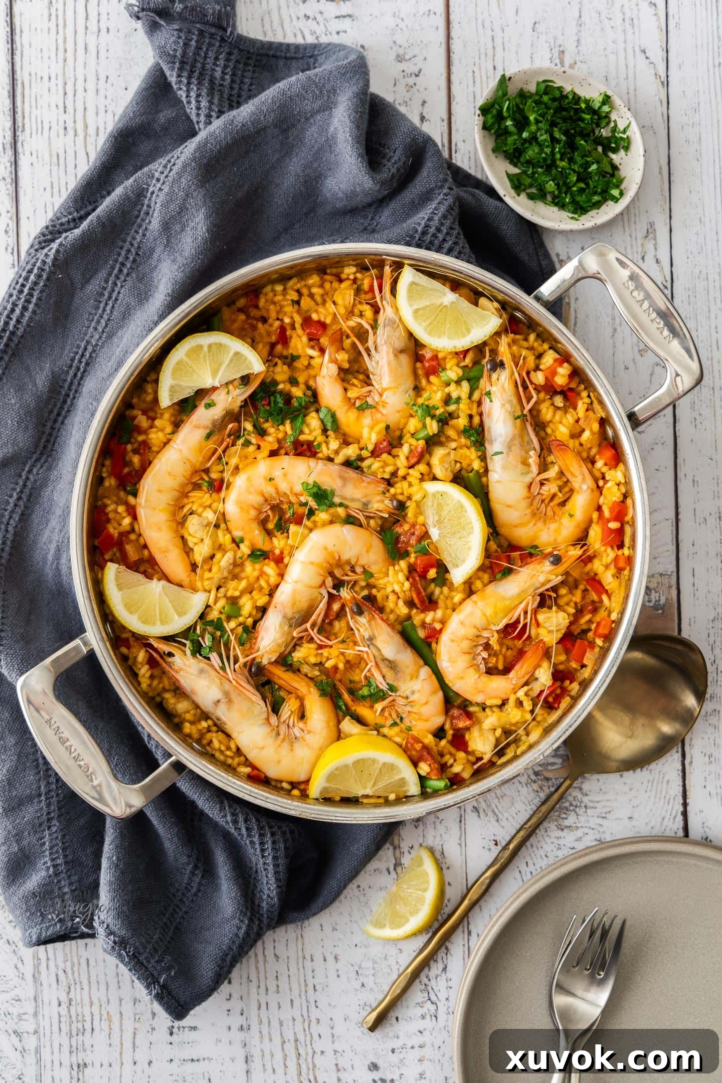 Top down view of prawn, chicken and chorizo paella.