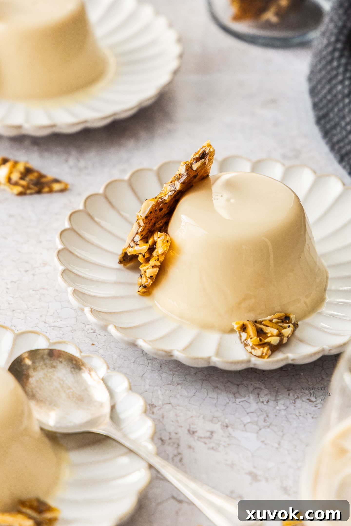 3 dessert plates each with a Baileys panna cotta and praline.