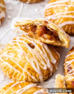 Half a peach pie showing the filling and pastry texture.