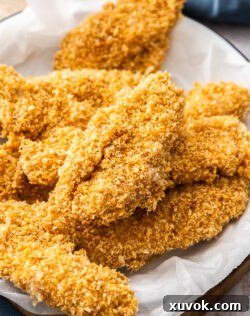 A batch of crunchy chicken tenders in a bowl.