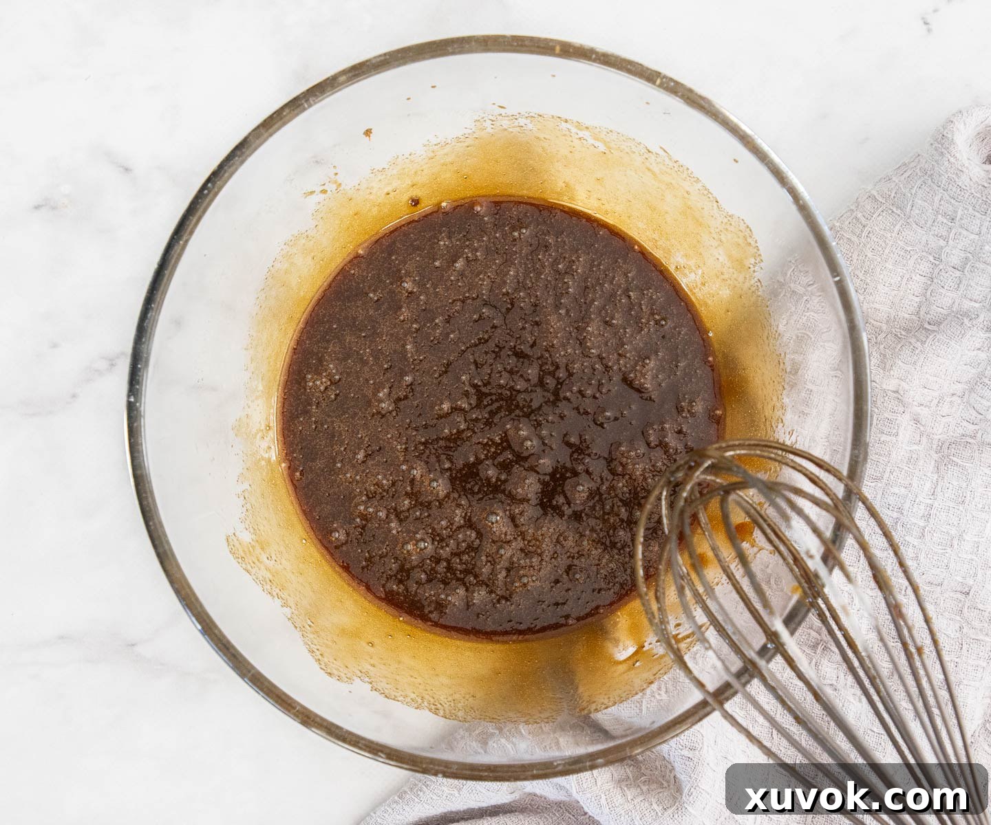The wet ingredients combined in a mixing bowl.