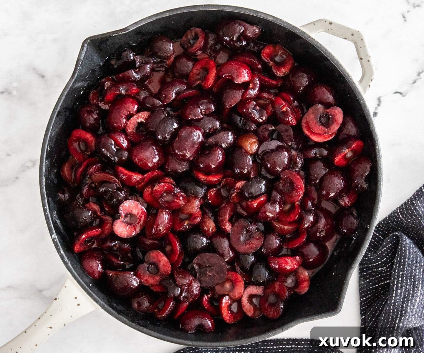 The cherry filling in the skillet.