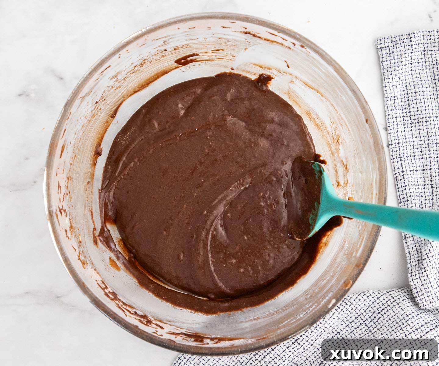 The brownie batter with the dry ingredients (flour, cocoa, salt) added, ready for gentle folding.
