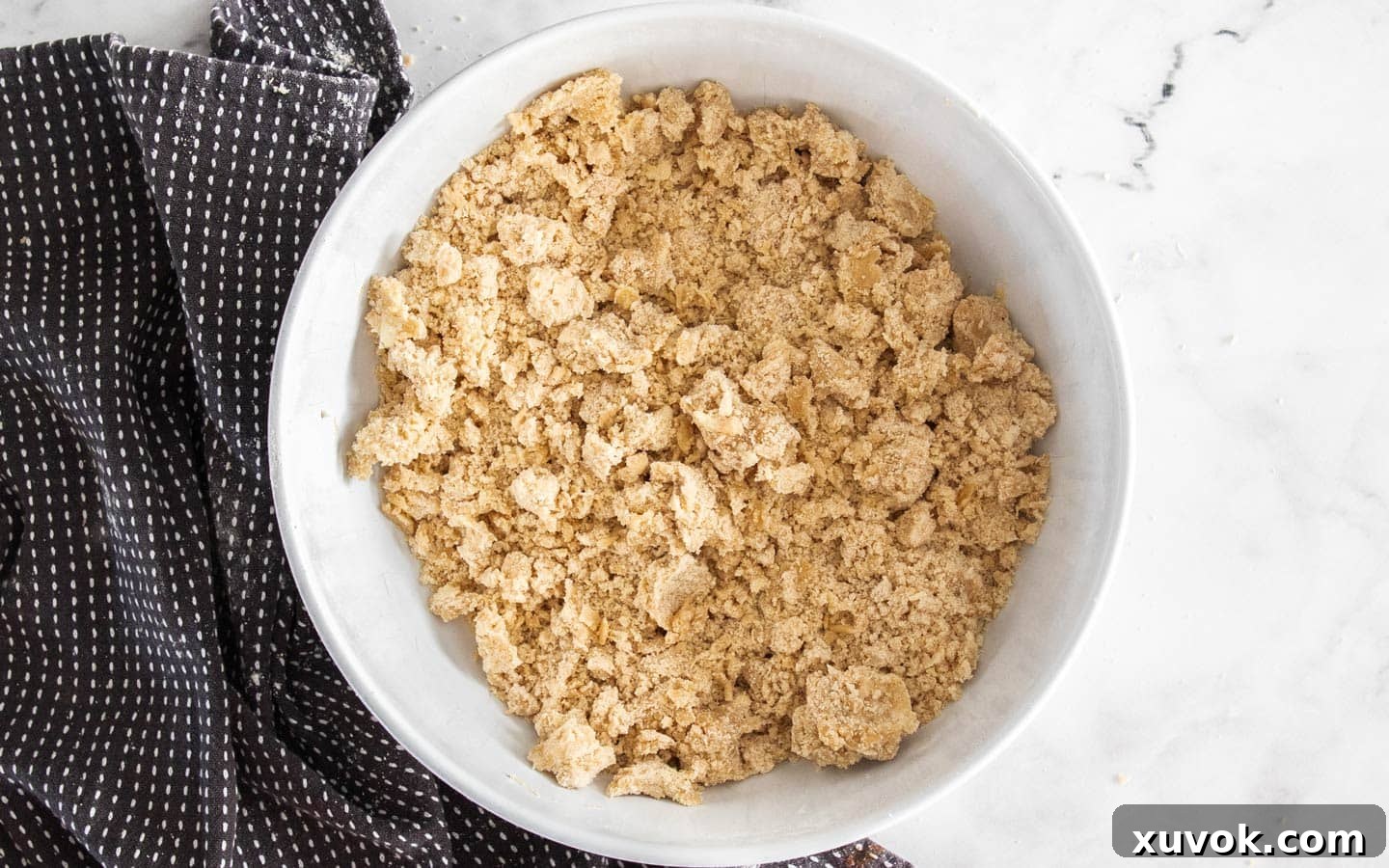 The finished shortbread cookie dough, now crumbly but able to clump, ready for use.