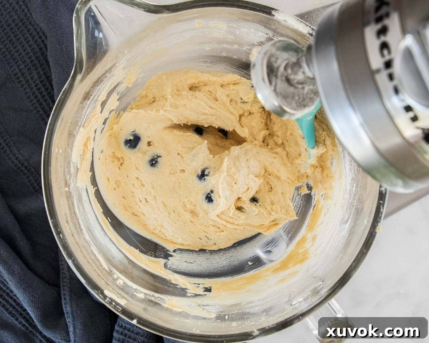 The batter once the blueberries have been mixed through.