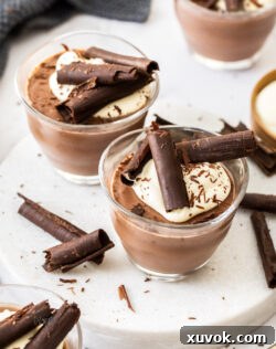 Closeup of 2 chocolate pots.