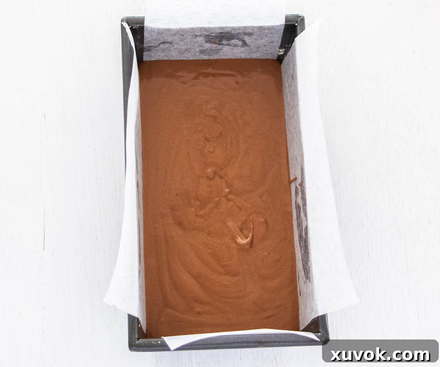 The chocolate layer in the tin.