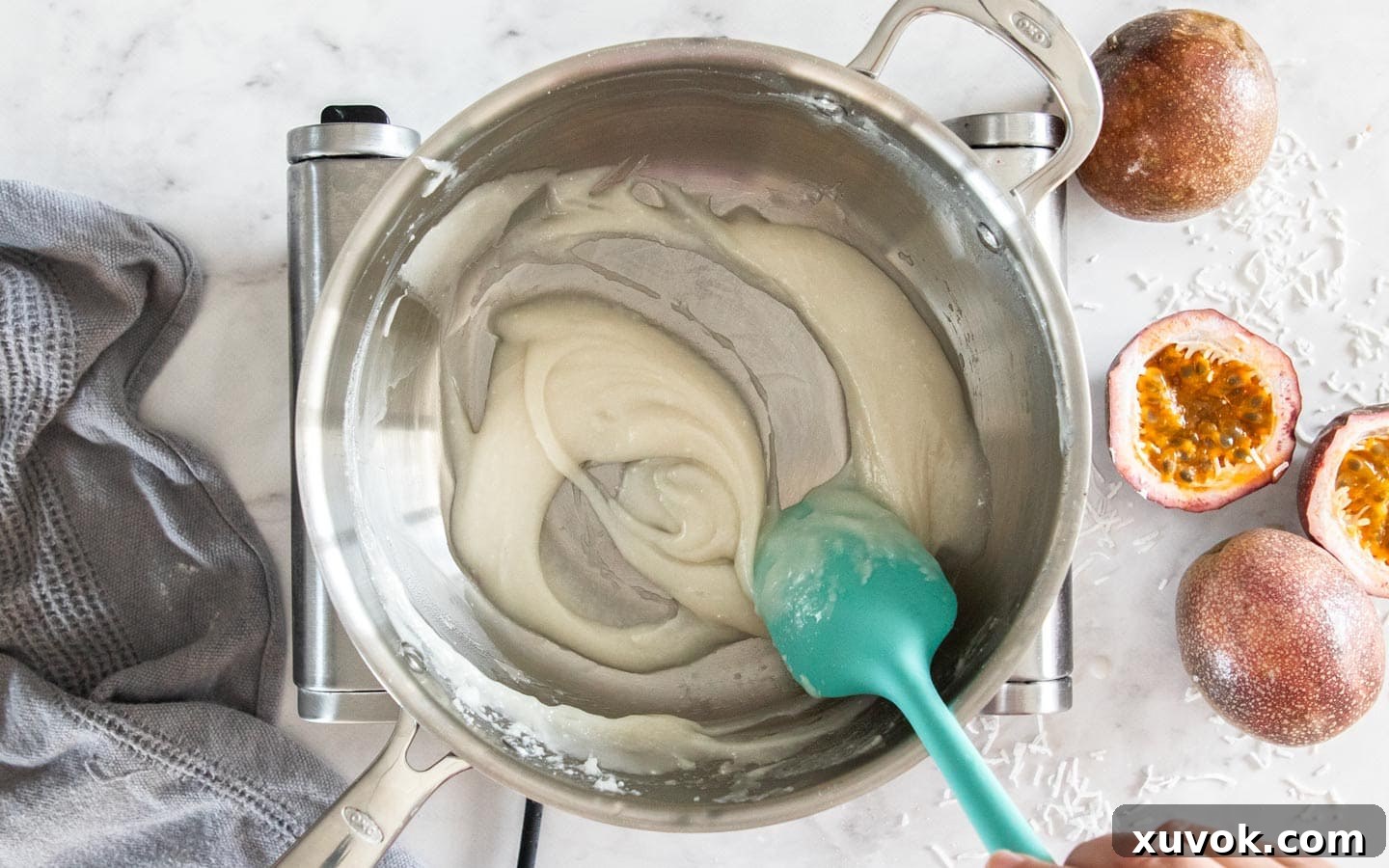 The flour paste for the ermine frosting cooking in a saucepan, showing its thick consistency.