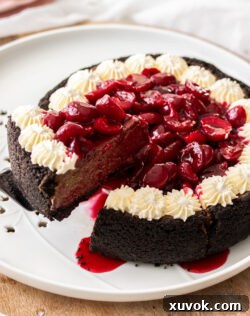 A slice being taken from the cheesecake.